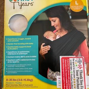 The First Years Baby Stretch Carrier - Size Large. Color Black. Brand new.